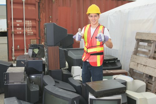Builders removing construction waste in Wallington